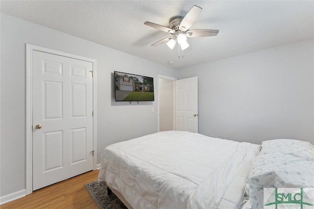 21 Carlisle Ln, Savannah, GA 31419 - bedroom featuring light wood-style flooring and a ceiling fan