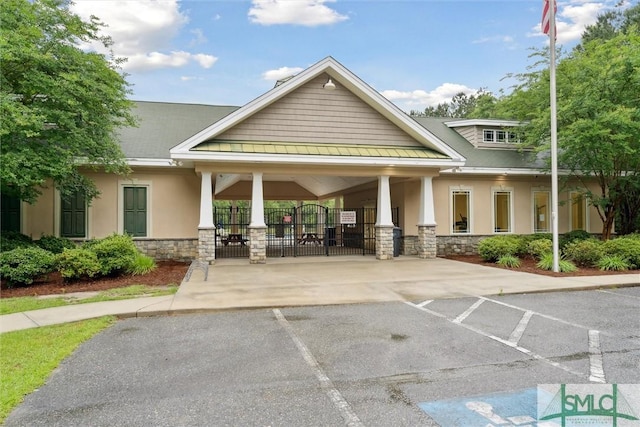 21 Carlisle Ln, Savannah, GA 31419 - view of building exterior featuring fence and uncovered parking