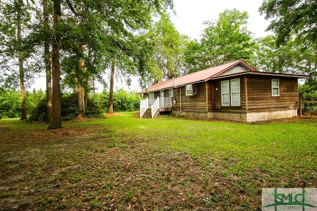 view of front of home featuring a front lawn