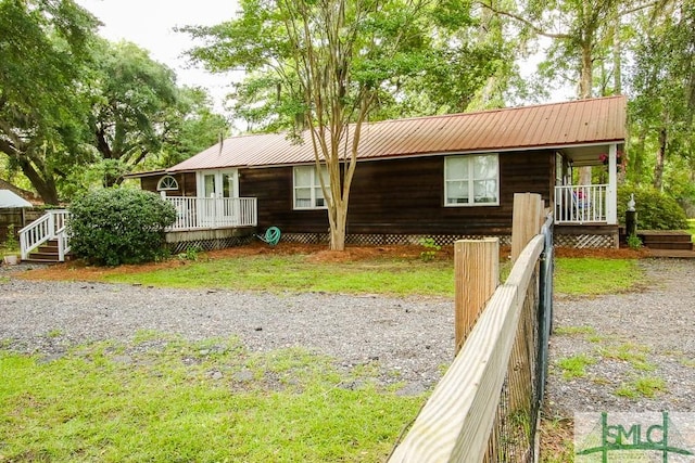view of front of property with metal roof