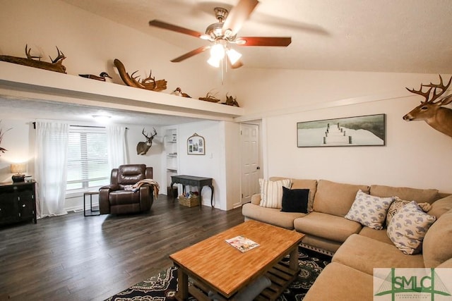 living area featuring a ceiling fan, wood finished floors, and high vaulted ceiling