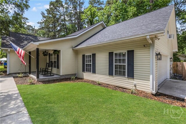 407 Middleton St, Pooler, GA 31322 - view of front of home featuring a shingled roof, an attached garage, covered porch, and concrete driveway
