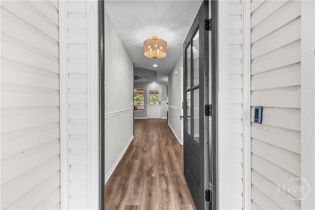 407 Middleton St, Pooler, GA 31322 - hall featuring wood finished floors, baseboards, and a chandelier
