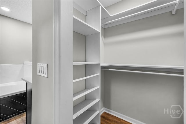 407 Middleton St, Pooler, GA 31322 - walk in closet featuring wood finished floors