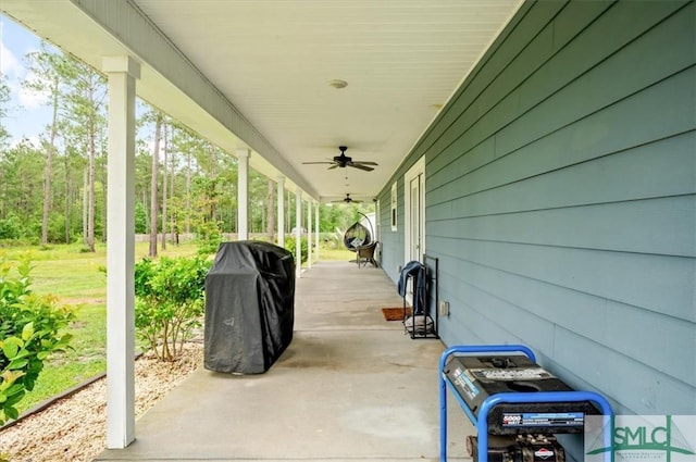 view of patio / terrace with a ceiling fan and a grill