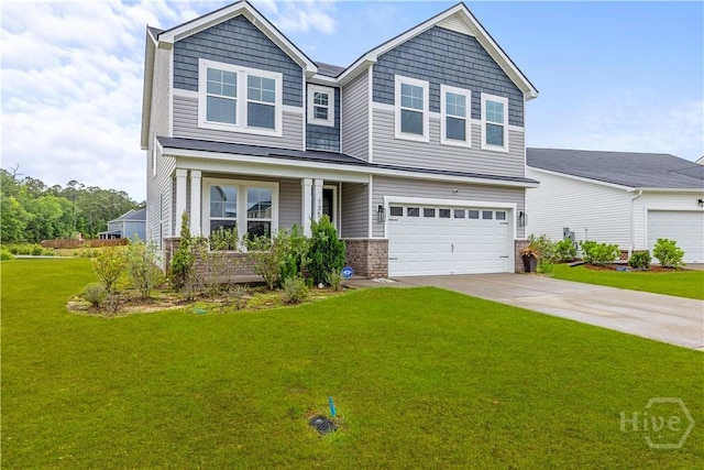 craftsman inspired home with a front lawn, a garage, driveway, and covered porch