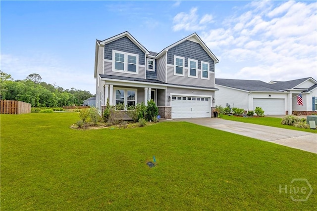 craftsman-style home with driveway and a garage
