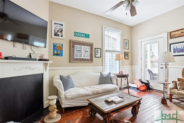 546548 E Huntingdon St, Savannah, GA 31401 - living area featuring ceiling fan, wainscoting, and hardwood / wood-style flooring