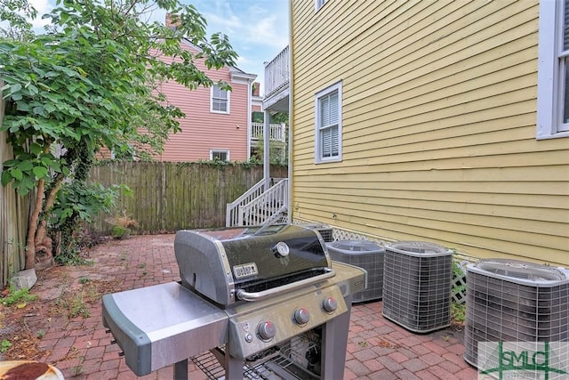 546548 E Huntingdon St, Savannah, GA 31401 - view of patio / terrace featuring central AC unit, fence, and area for grilling