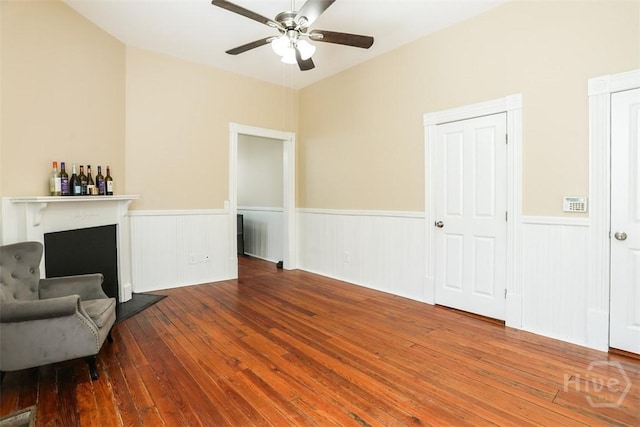 546548 E Huntingdon St, Savannah, GA 31401 - unfurnished room with wainscoting, ceiling fan, and hardwood / wood-style flooring