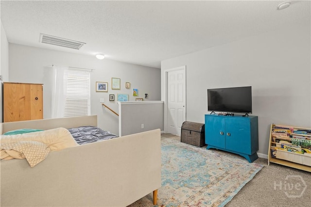 bedroom featuring carpet floors and baseboards