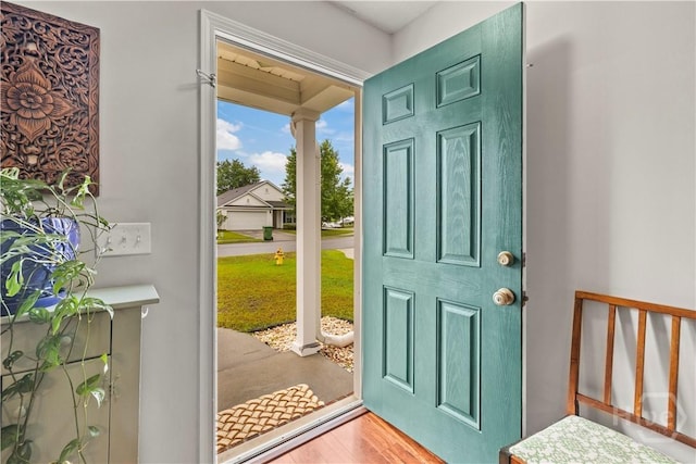 doorway to outside with wood finished floors