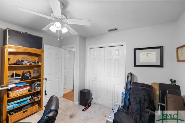 office area featuring ceiling fan and carpet flooring