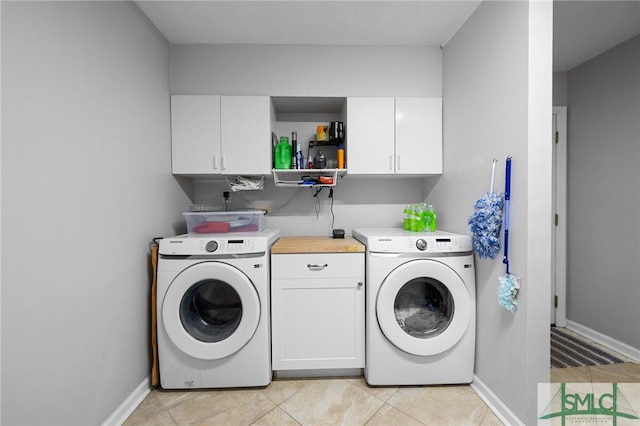 8 Chowning Dr, Savannah, GA 31419 - laundry room featuring cabinet space, baseboards, and light tile patterned floors