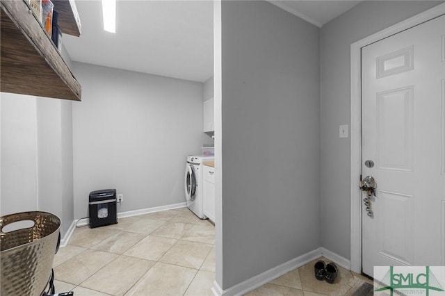 8 Chowning Dr, Savannah, GA 31419 - washroom with washer and clothes dryer, light tile patterned floors, cabinet space, and baseboards