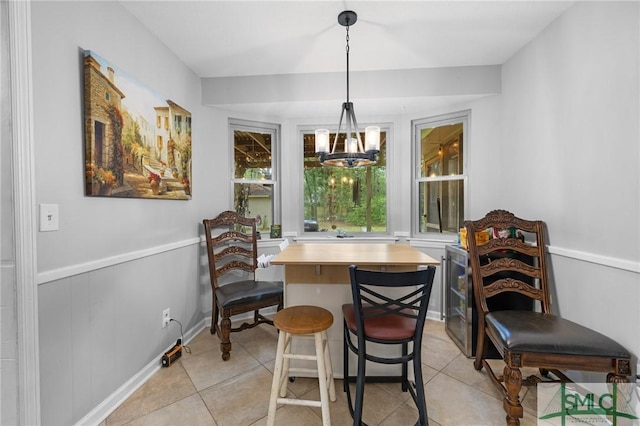 8 Chowning Dr, Savannah, GA 31419 - dining area featuring light tile patterned floors and a chandelier