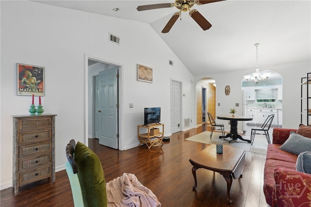211 Edgewater Rd Unit 22, Savannah, GA 31406 - living room featuring arched walkways, a ceiling fan, wood finished floors, high vaulted ceiling, and a chandelier