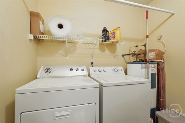 211 Edgewater Rd Unit 22, Savannah, GA 31406 - clothes washing area with washing machine and clothes dryer and water heater