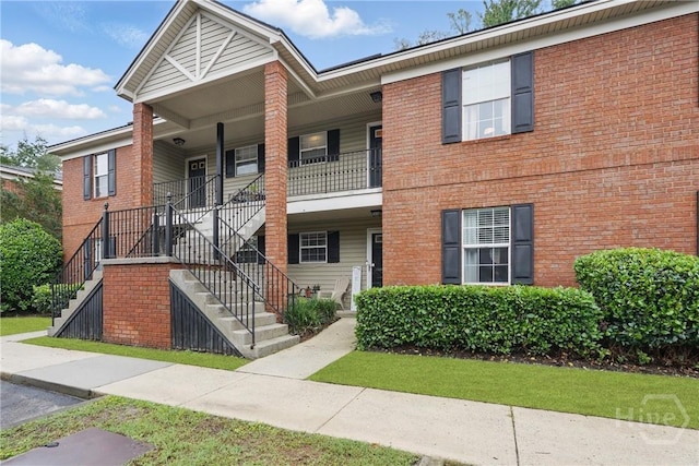 211 Edgewater Rd Unit 22, Savannah, GA 31406 - multi unit property with stairs, brick siding, and a porch