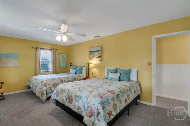506 Butler Ave, Tybee Island, GA 31328 - bedroom with carpet flooring, ceiling fan, and baseboards