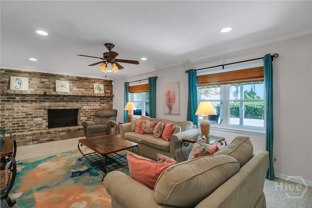506 Butler Ave, Tybee Island, GA 31328 - living room featuring a ceiling fan, recessed lighting, baseboards, crown molding, and a brick fireplace