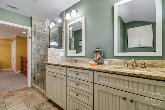 506 Butler Ave, Tybee Island, GA 31328 - full bathroom featuring a shower stall, double vanity, lofted ceiling, and baseboards