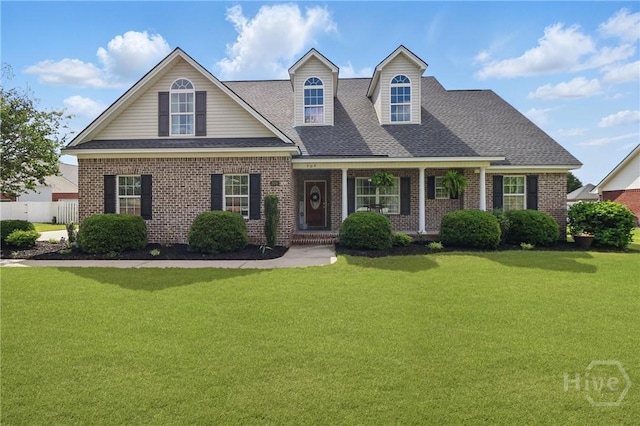 509 Braves Field Dr, Guyton, GA 31312 - view of front facade featuring brick siding, a porch, and a shingled roof