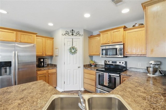 509 Braves Field Dr, Guyton, GA 31312 - kitchen featuring appliances with stainless steel finishes, a sink, and recessed lighting