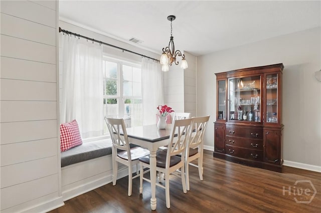 509 Braves Field Dr, Guyton, GA 31312 - dining room featuring a chandelier, dark wood finished floors, and baseboards