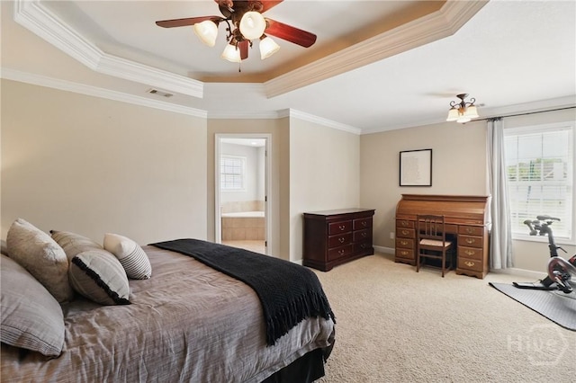 509 Braves Field Dr, Guyton, GA 31312 - bedroom with a raised ceiling, multiple windows, crown molding, carpet floors, and connected bathroom