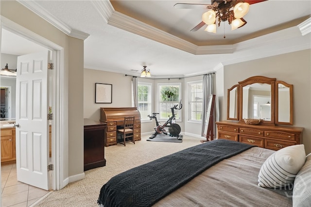 509 Braves Field Dr, Guyton, GA 31312 - bedroom with crown molding, a tray ceiling, baseboards, and light colored carpet