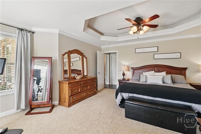 509 Braves Field Dr, Guyton, GA 31312 - bedroom with crown molding, carpet, a tray ceiling, baseboards, and ceiling fan