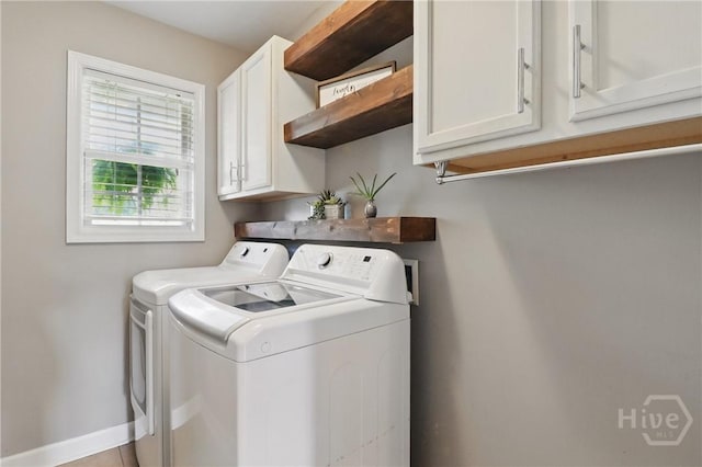 509 Braves Field Dr, Guyton, GA 31312 - laundry area featuring separate washer and dryer, cabinet space, and baseboards