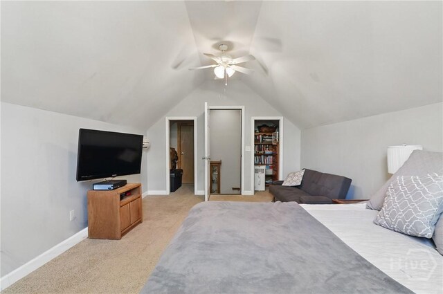 509 Braves Field Dr, Guyton, GA 31312 - bedroom featuring light colored carpet, baseboards, vaulted ceiling, and a ceiling fan