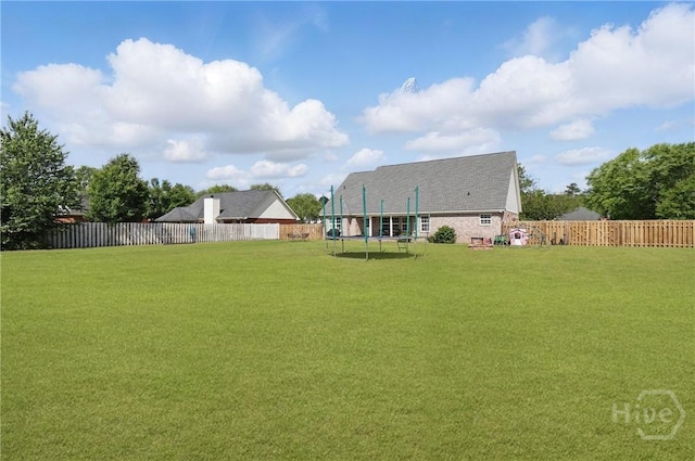 509 Braves Field Dr, Guyton, GA 31312 - view of yard featuring a trampoline