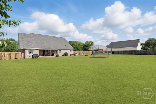 509 Braves Field Dr, Guyton, GA 31312 - view of yard with a trampoline