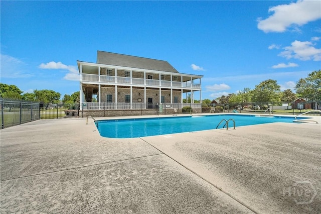 509 Braves Field Dr, Guyton, GA 31312 - community pool featuring fence and a patio area