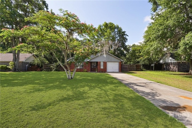 1405 Desert Storm Dr, Hinesville, GA 31313 - view of front of property with concrete driveway, brick siding, and a detached garage