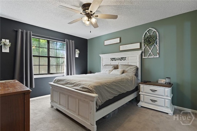 1405 Desert Storm Dr, Hinesville, GA 31313 - bedroom with carpet floors, a textured ceiling, baseboards, and a ceiling fan