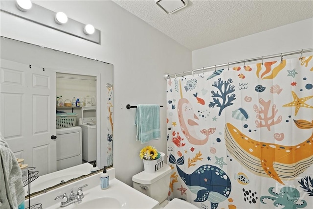 1405 Desert Storm Dr, Hinesville, GA 31313 - full bathroom with independent washer and dryer, a textured ceiling, a sink, toilet, and curtained shower