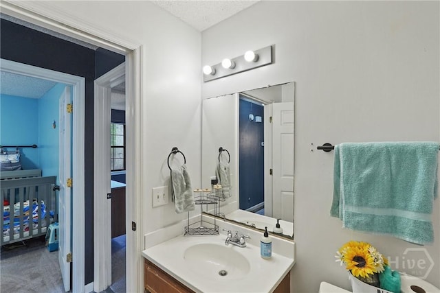 1405 Desert Storm Dr, Hinesville, GA 31313 - half bathroom with vanity and a textured ceiling
