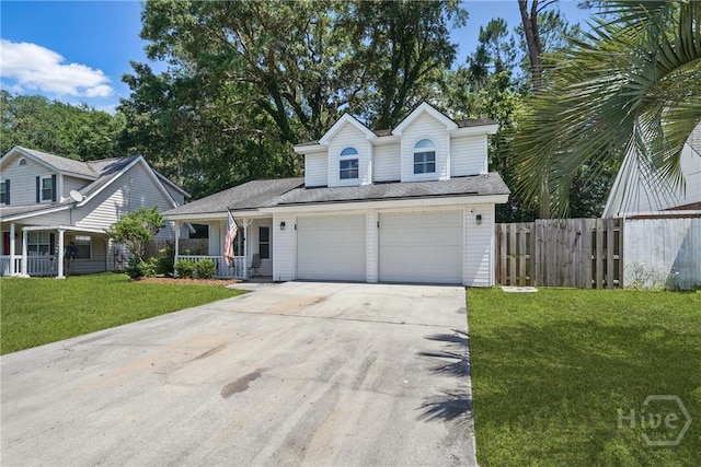 129 Penn Sta, Savannah, GA 31410 - traditional-style house with a porch, driveway, and a garage