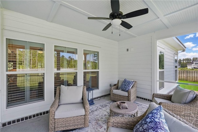 view of patio featuring a ceiling fan, an outdoor hangout area, and fence