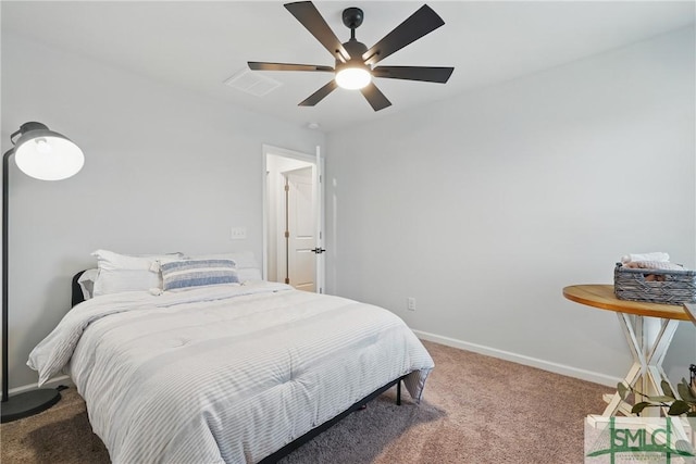 1546 Wilkins Rd, Midway, GA 31320 - bedroom with carpet floors, baseboards, and ceiling fan