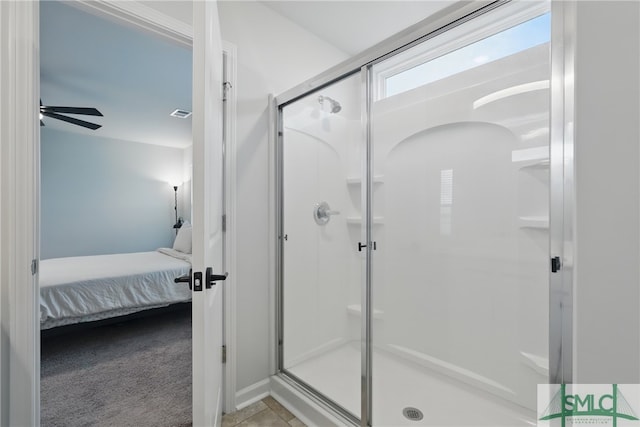 1546 Wilkins Rd, Midway, GA 31320 - ensuite bathroom featuring a stall shower and ceiling fan