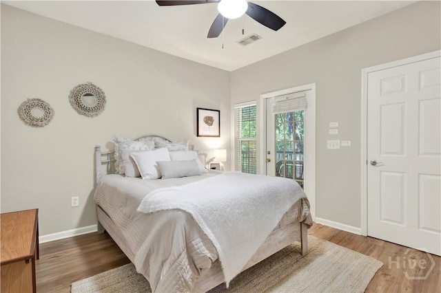 3021 Whitemarsh Way, Savannah, GA 31410 - bedroom with access to outside, baseboards, wood finished floors, and ceiling fan