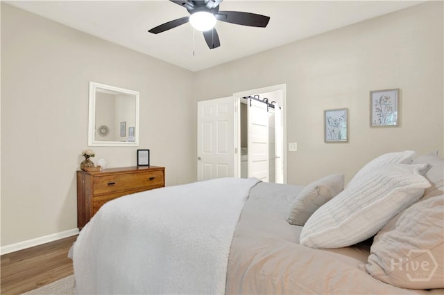 3021 Whitemarsh Way, Savannah, GA 31410 - bedroom featuring wood finished floors, baseboards, and a ceiling fan