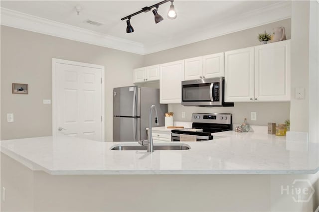3021 Whitemarsh Way, Savannah, GA 31410 - kitchen with stainless steel appliances, crown molding, light stone countertops, a sink, and white cabinets