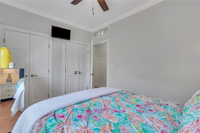 5 17th St, Tybee Island, GA 31328 - bedroom featuring ornamental molding, ceiling fan, tile patterned flooring, and a closet