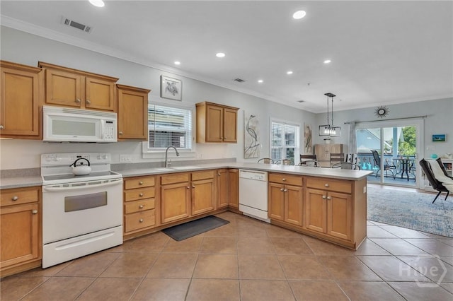 5 17th St, Tybee Island, GA 31328 - kitchen featuring white appliances, a peninsula, ornamental molding, recessed lighting, and light tile patterned flooring